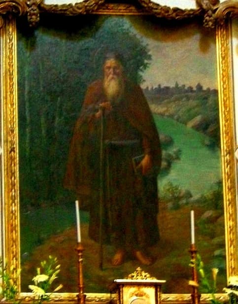 Conrad of Piacenza: framed painting of a robed hermit in a green landscape