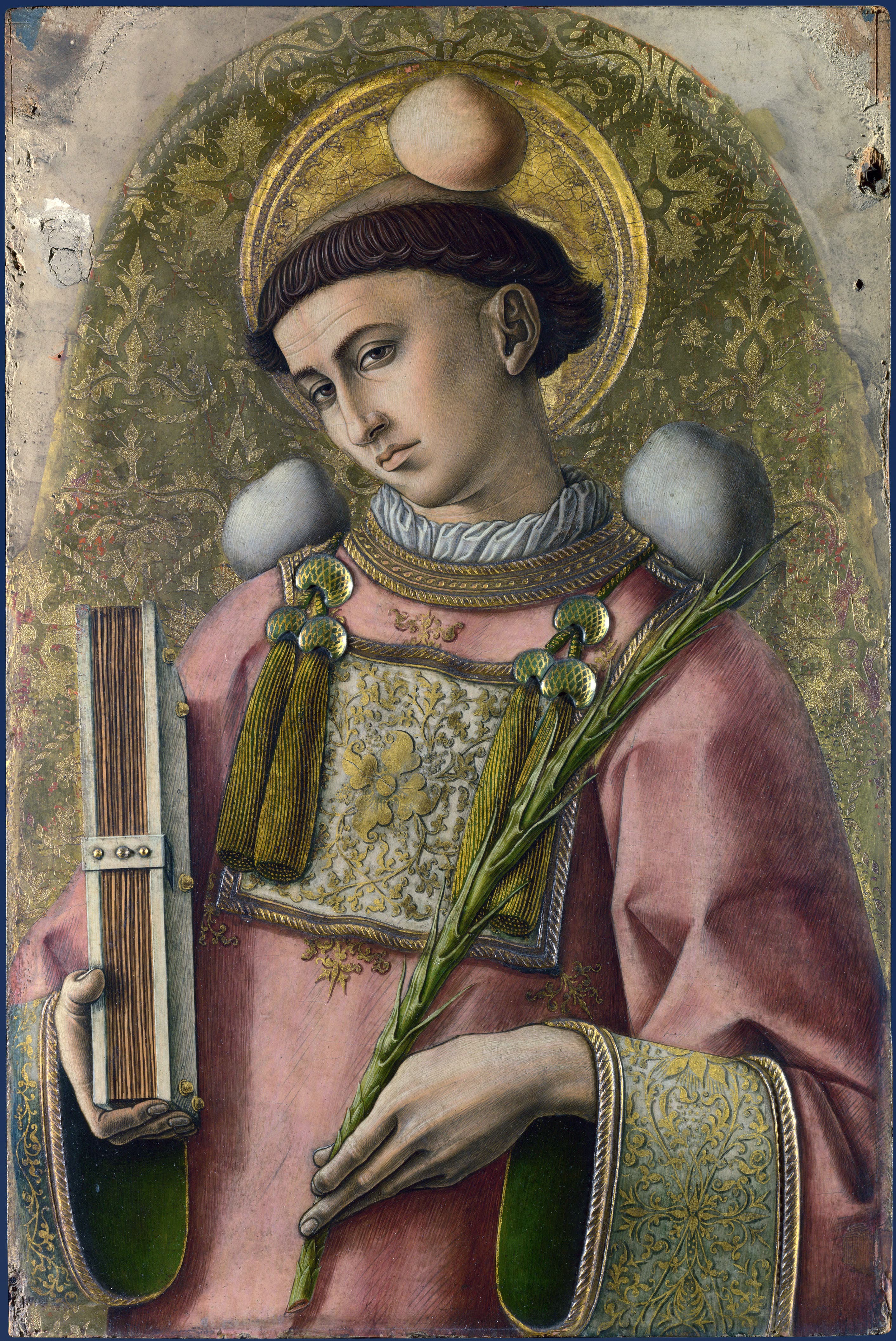 Saint Stephen holding a book and martyr's palm, with stones at his head and shoulders, in Carlo Crivelli's 1476 painting.