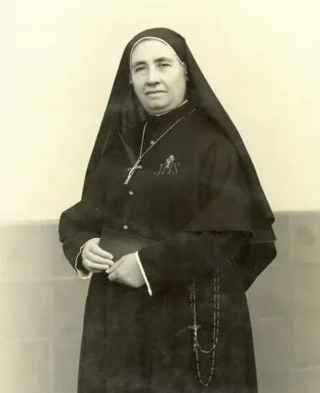 María Guadalupe García Zavala: sepia photograph of a nun standing in a dark habit