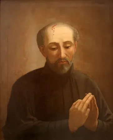 Isaac Jogues: painting of a bearded priest with hands joined in prayer