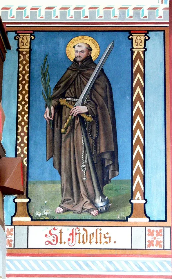 Fidelis of Sigmaringen: painted statue of a friar holding a palm branch and book