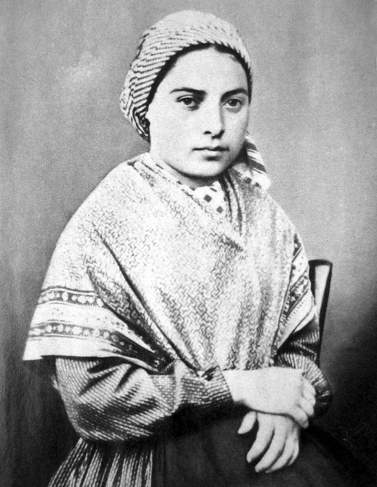 Bernadette Soubirous: black-and-white photograph of a young woman wearing a head covering and shawl