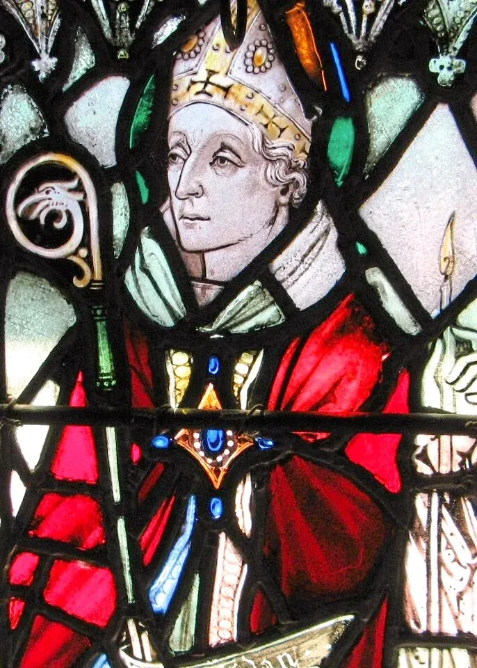 Aidan of Lindisfarne: stained-glass bishop wearing a mitre and holding a staff