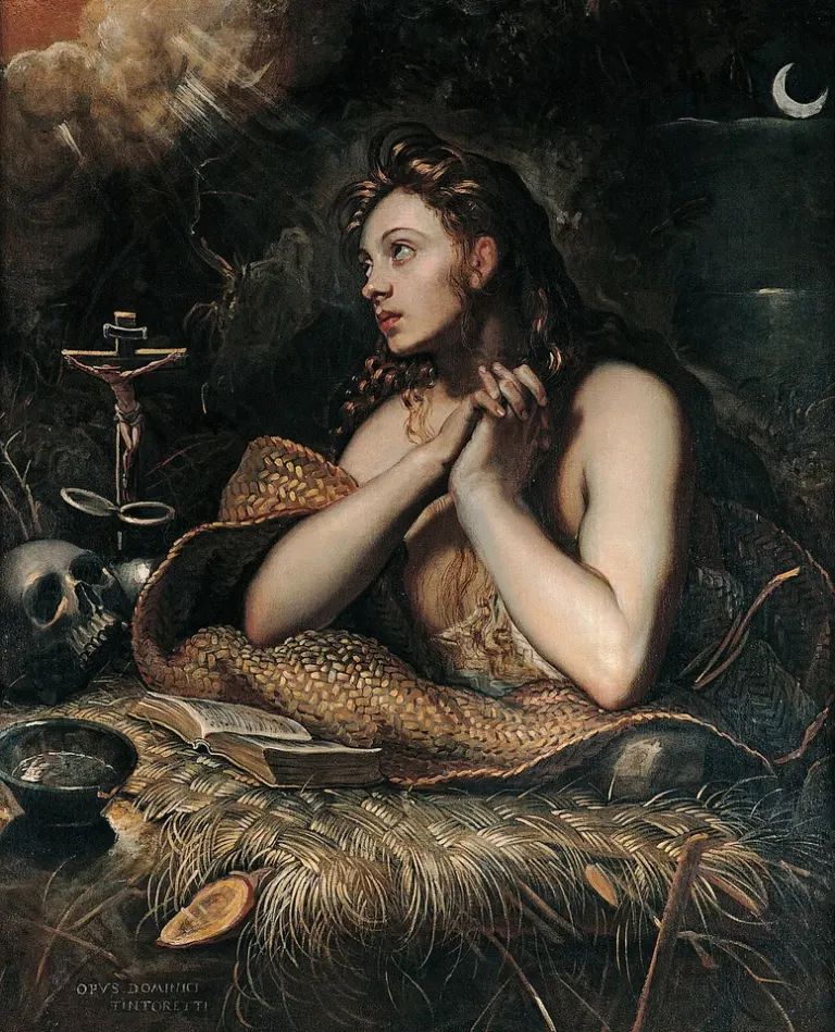 Mary Magdalene: painting of a woman praying beside a crucifix in a rocky setting