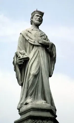 John of Kanty (John Cantius): outdoor statue of a cleric holding a book