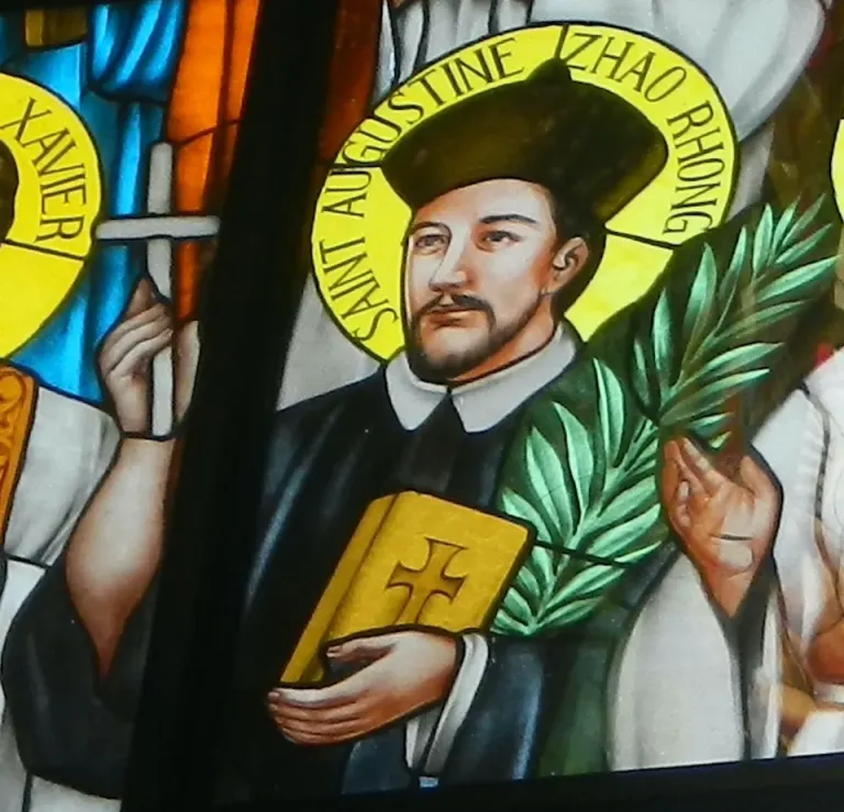 Augustine Zhao Rong: stained-glass priest holding a book and palm branch