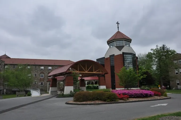 Entrance to the Saint Katharine Drexel shrine in Bensalem, with a cross-topped tower