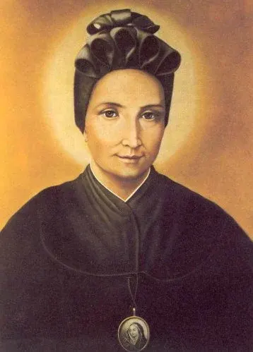 Magdalene of Canossa: portrait of a woman in a dark dress wearing a devotional medal