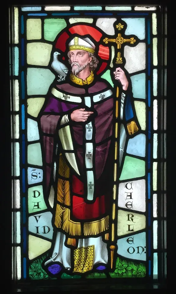 David of Wales: stained-glass bishop holding a cross and book