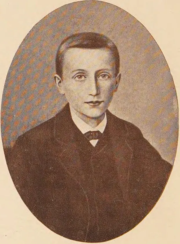 Dominic Savio: oval portrait of a boy in a dark jacket