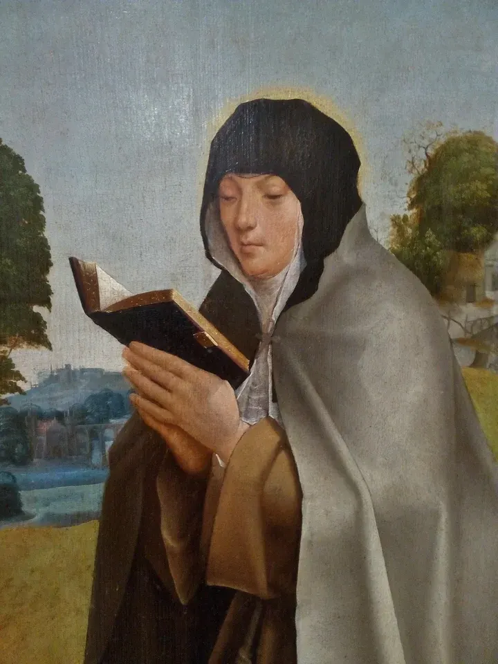 Colette of Corbie: painting of a nun reading outdoors